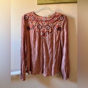 Francesca’s pink embroidered long sleeve top